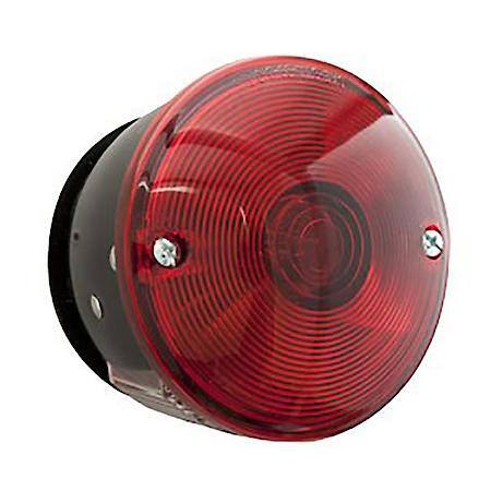 Stud mount combination stop/turn/tail light with license illuminator